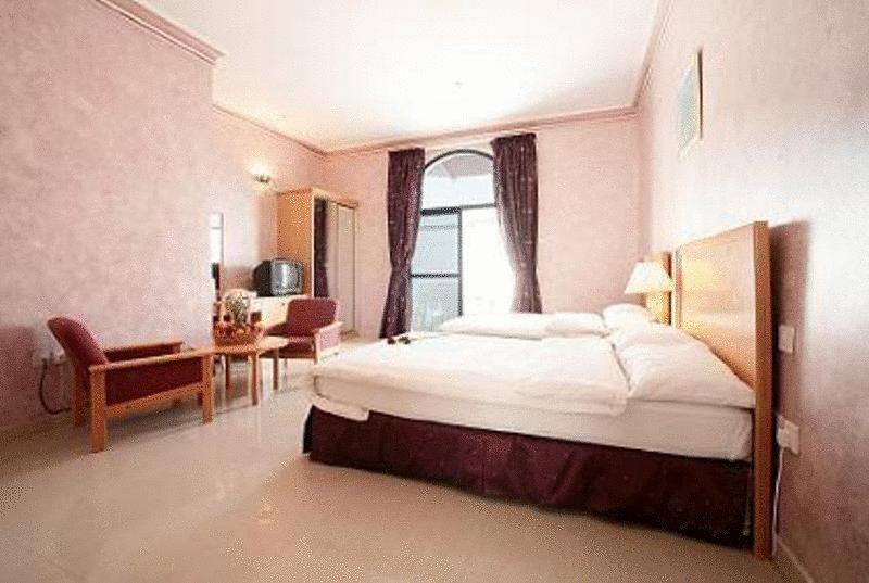 Beach Hotel Muscat Cameră foto